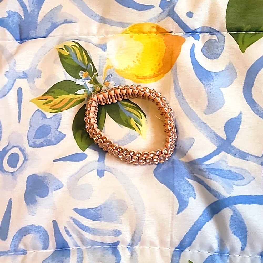 Good condition. Pink dimond bracelet.